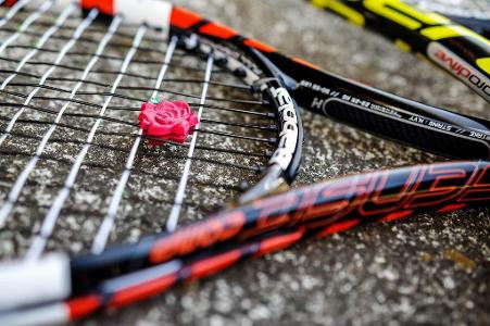 What is the purpose of a tennis dampener?