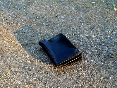 You found a wallet on the ground. What do you do?