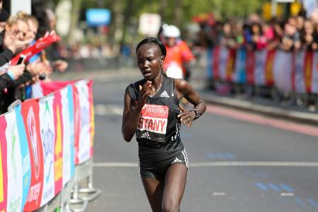 In which city was the Men's world record Marathon time run?
