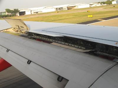 What is the purpose of the flaps on an airplane's wings?