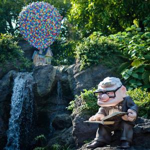 In the movie Up, what is the name of the old man who flies his house using balloons?