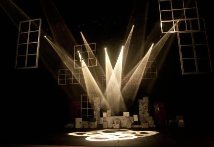 What is the purpose of lighting design in theater?