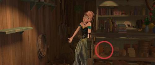 In Oaken's trade shop what is on a shelf (hidden) behind Anna?