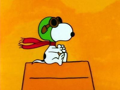 Which comic strip features a famous beagle named Snoopy?
