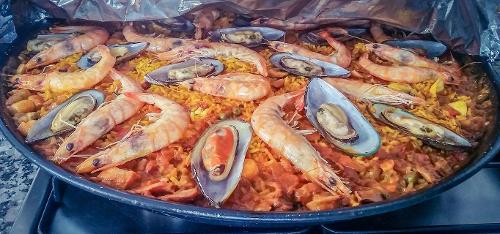 In which country is the traditional dish 'Paella' from?