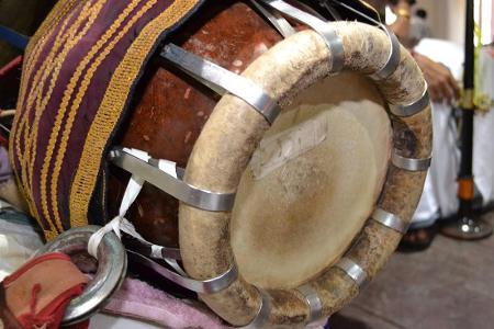 What is the name of the traditional Indian percussion instrument often used in Bollywood music?