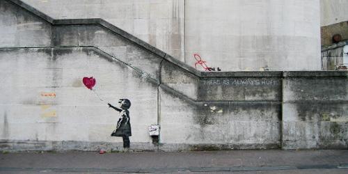 Who is known for the 'Balloon Girl' stencil piece in London?