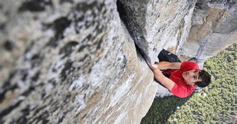 Which famous rock climber is known for his impressive solo ascents without ropes?