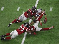 Julian Edelman's amazing catch with 3 Falcons players there