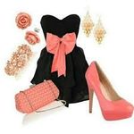 A black strapless dress with a pink bow and pink heels A black strapless dress with a pink bow and pink heels