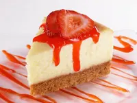 Cheesecake with strawberries on top Cheesecake with strawberries on top