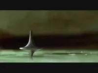 At the end of Inception is Dom still in his dream? The totem didn't stop spinning...does it mean that Dominick Cobb is in a dream, not reality? At the end of Inception is Dom still in his dream? The totem didn't stop spinning...does it mean that Dominick Cobb is in a dream, not reality?
