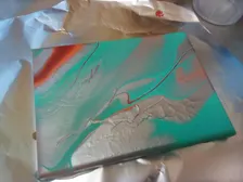 Silver paint pour w/ little red and orange. turqouise. I MADE THIS