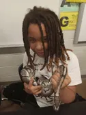 LOOK AT MY BABY HOLDING A SNAKE, HE LOOKS SO HAPPY