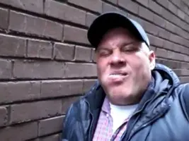 Man Eats 87 SpongeBob Stickers in an Alley Man Eats 87 SpongeBob Stickers in an Alley