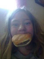 Hey, um...I'm back. This is a bit weird and all but...I came back. Here's me with a burger in my mouth. Hey, um...I'm back. This is a bit weird and all but...I came back. Here's me with a burger in my mouth.