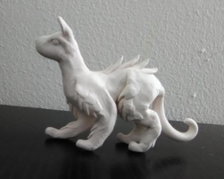 Hey any color suggestions for this sculpture? I made this dog, cat, dragon thing and I don't know what colors to paint it (And yes I know the face is a little, just a little screwed up). Hey any color suggestions for this sculpture? I made this dog, cat, dragon thing and I don't know what colors to paint it (And yes I know the face is a little, just a little screwed up).