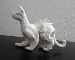 Hey any color suggestions for this sculpture? I made this dog, cat, dragon thing and I don't know what colors to paint it (And yes I know the face is a little, just a little screwed up). Hey any color suggestions for this sculpture? I made this dog, cat, dragon thing and I don't know what colors to paint it (And yes I know the face is a little, just a little screwed up).
