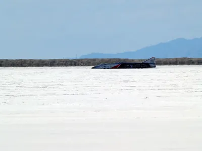 Which car held the title of the fastest electric car in the world before the Rimac C_Two?