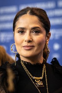 Which actress has earned the title of the highest-paid in Hollywood multiple times?
