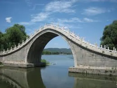 Which bridge is destroyed at the beginning of Harry Potter and the Half-Blood Prince?