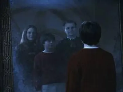 which one of these characters was teh professor who told harry at the end of their conversation that he looked very much like his father and had also inherited his fathers talent for trouble?