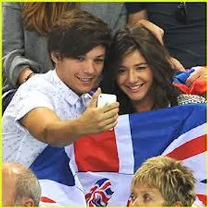 what is the FULL name of louis's girlfriend?