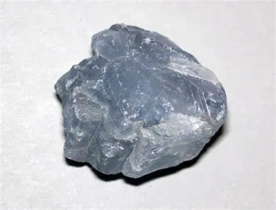 What is the name for a naturally occurring solid aggregate of minerals or mineraloids?