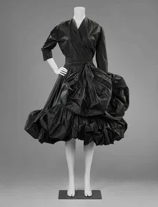 Which designer popularized the wrap dress?