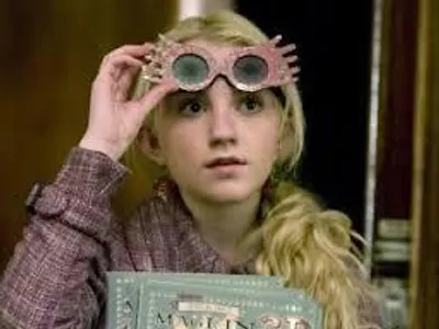 What vegetable do Luna Lovegood’s earrings resemble in Harry Potter and the Order of the Phoenix?