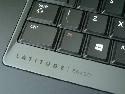 What is the purpose of the Function (Fn) key on many laptop keyboards?