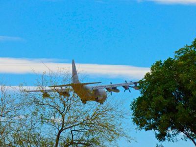Which type of airplane is specially modified to carry and release water or fire retardants for firefighting purposes?