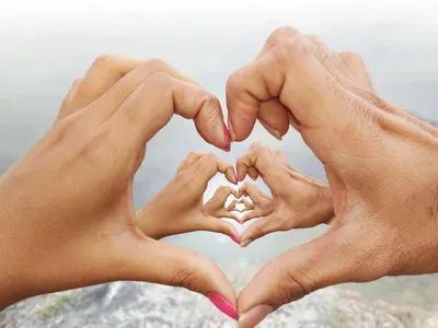 Which gesture is considered a symbol of eternal love?