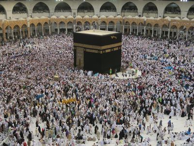 Which direction do Muslims face during daily prayers?