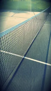 How high should a tennis net be?