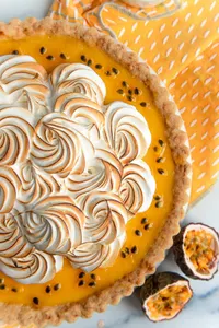 What dessert consists of a crispy, thin pastry shell filled with a sweet and creamy custard?