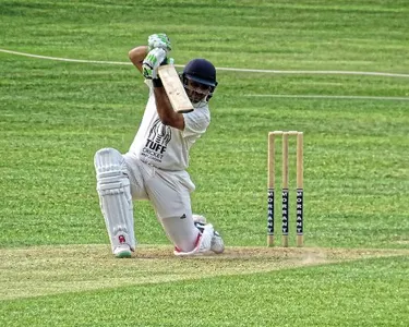 Which fielding position is positioned on the off side, close to the batsman?