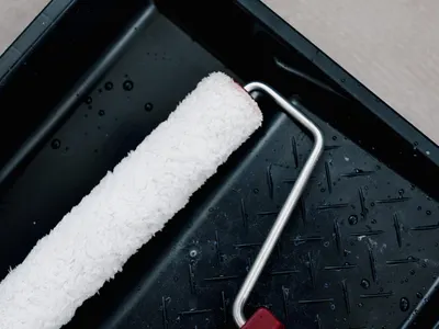 When painting a car, what type of roller should be used?