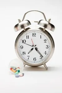 If someone "passes the time", what are they doing?