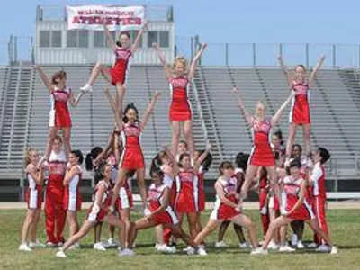 who is the cheer leading coach?