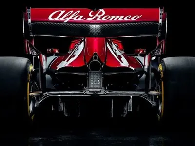 Which company supplies engines to the Alfa Romeo Racing F1 Team?