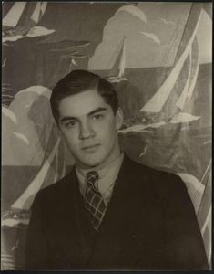 Which famous fashion designer is known for his eclectic tie collections?