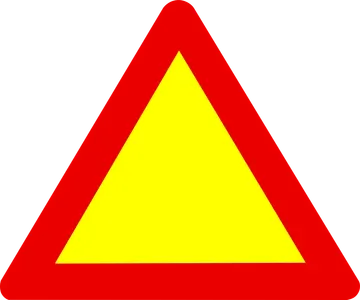 What does a red triangle road sign indicate?