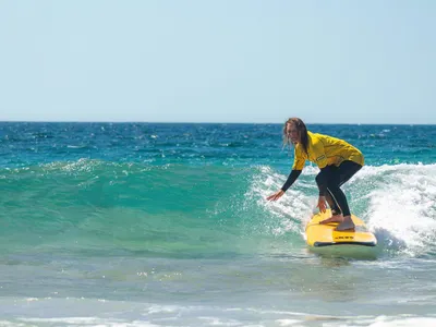 Which country hosted the first-ever surfing competition in history in 1885?