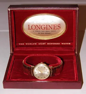 Which watch brand introduced the first automatic wristwatch?