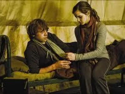 which film does Ron realize his true feelings for hermione?