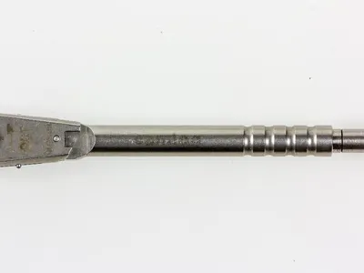 Which tool is used to tighten or loosen bolts?