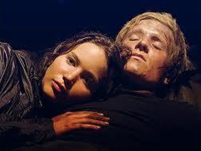 Who almost kills Katniss?
