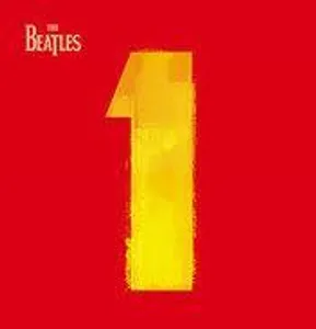 What was The Beatles first ever No. 1 hit?