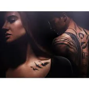 What is the tattoo Tris has on the back of her shoulder (not the one in the photo)?